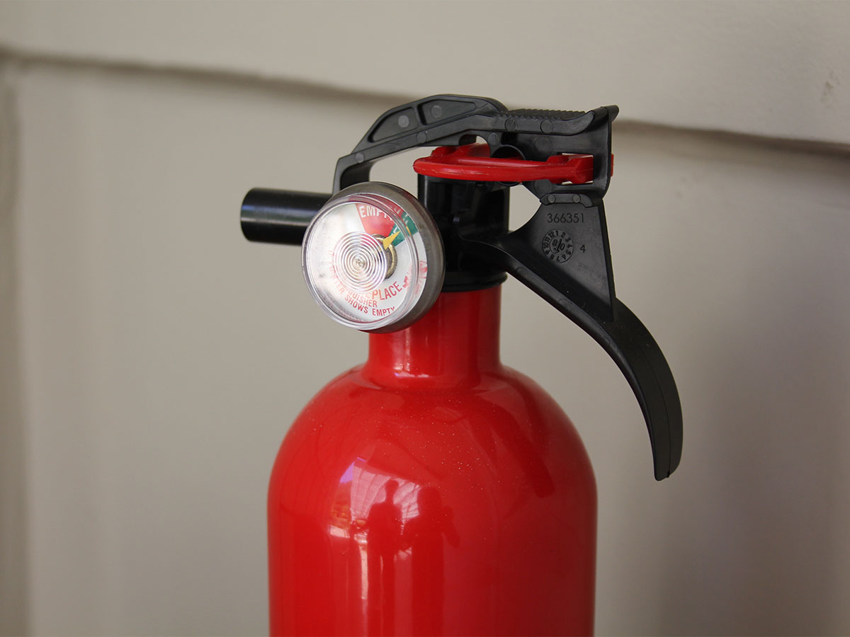 Check fire extinguishers pressure