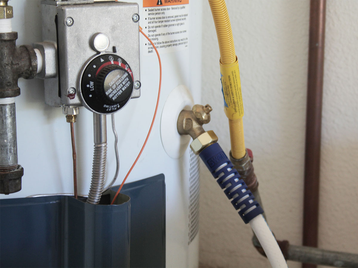 Flush water in hot water heaters