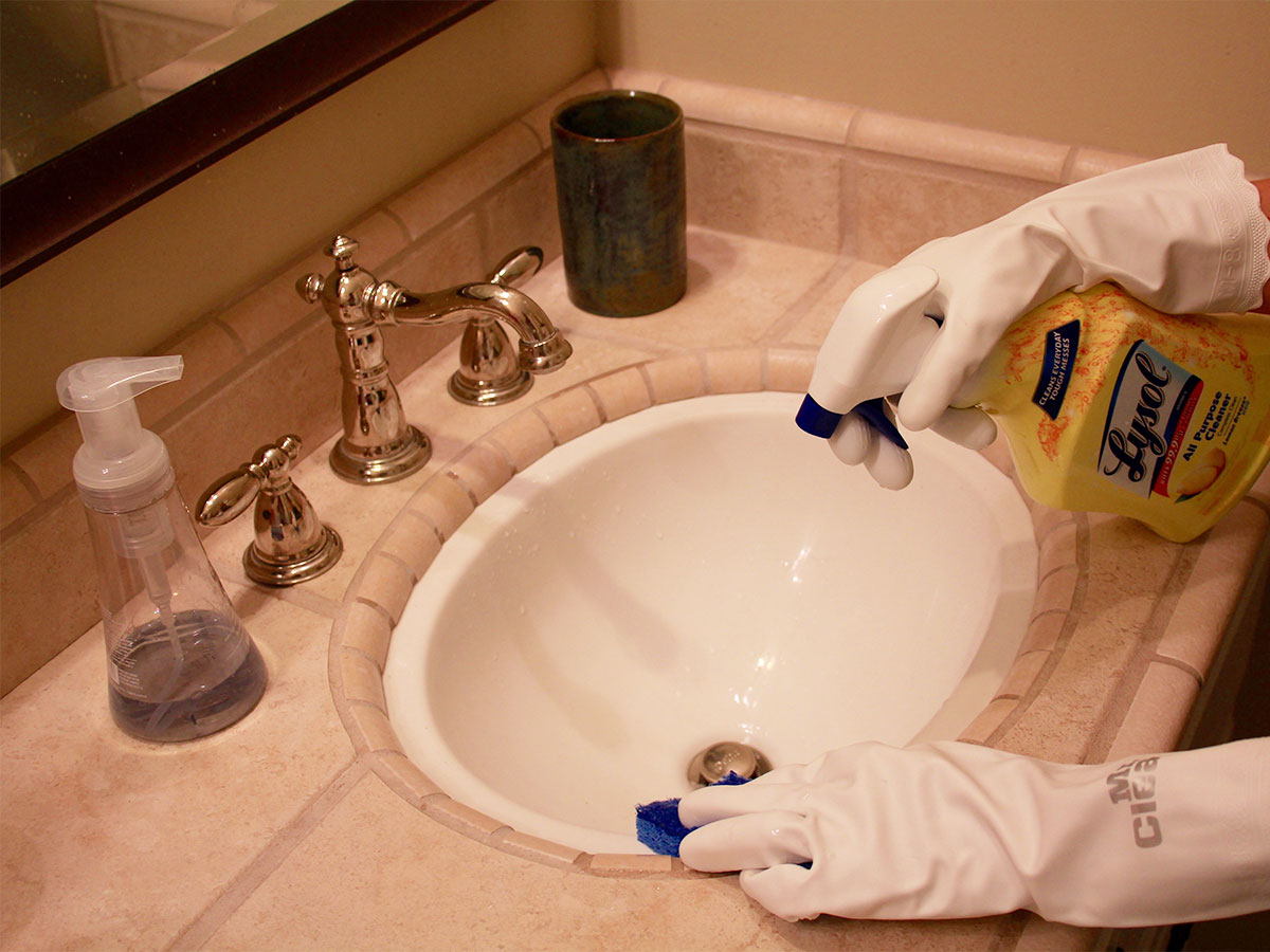 Clean toilets, bathtubs, showers, and sinks.