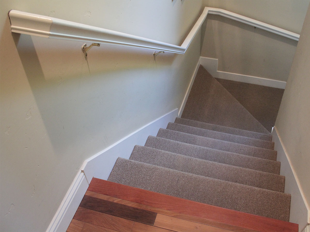Dust staircase and banisters